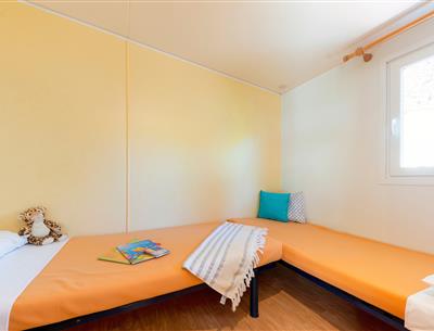 Slaapkamer van de Cottage 4 pers 2 bloemen