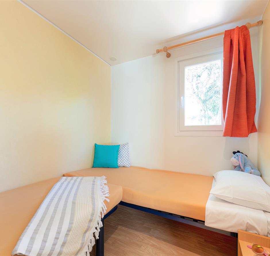 Slaapkamer van de Cottage 4 pers 2 bloemen 