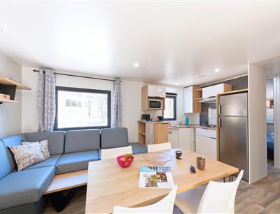 Woonkamer van de Cottage 6 personen 3 slaapkamers 4 bloemen