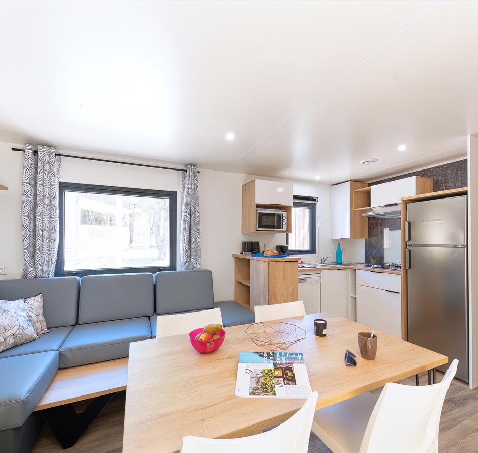 Woonkamer van de Cottage 6 personen 3 slaapkamers 4 bloemen 