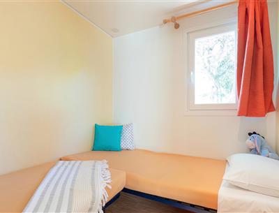 Slaapkamer van de Cottage 4 pers 2 bloemen