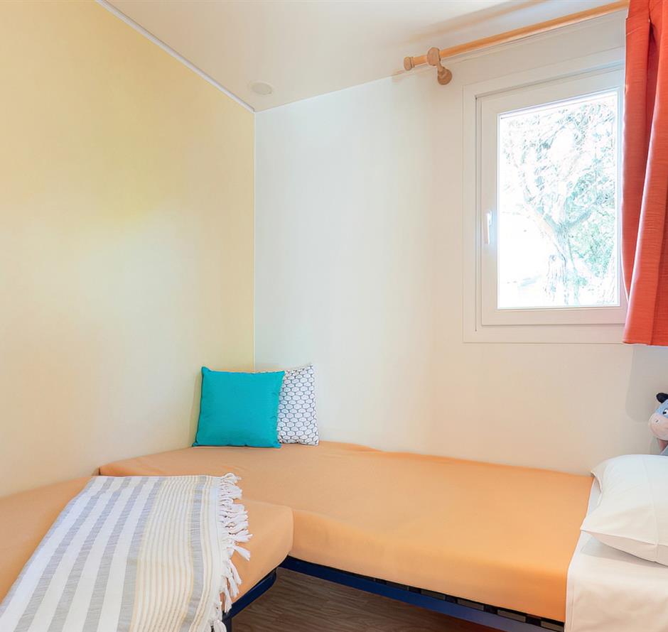Slaapkamer van de Cottage 4 pers 2 bloemen 